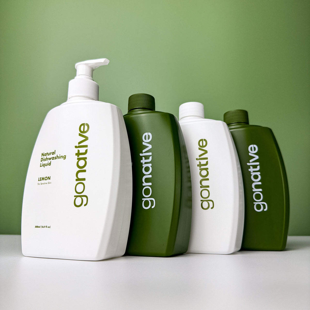 GoNative coconut-based natural dishwashing liquid, lemon, 4-pack of 500ml bottles: white pump bottle, white and green bottles